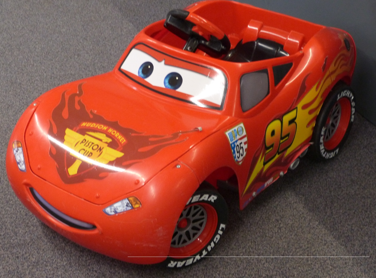 Disney Cars Lightning McQueen electric 'pedal' car, 100x54cm.