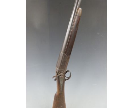 Army &amp; Navy 12 bore single barrel hammer action shotgun with named and engraved lock, chequered grip and horn tipped fore