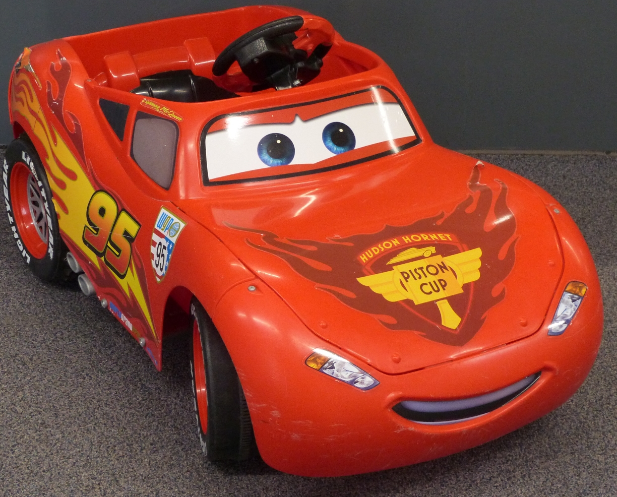 Disney Cars Lightning McQueen electric 'pedal' car, 100x54cm.