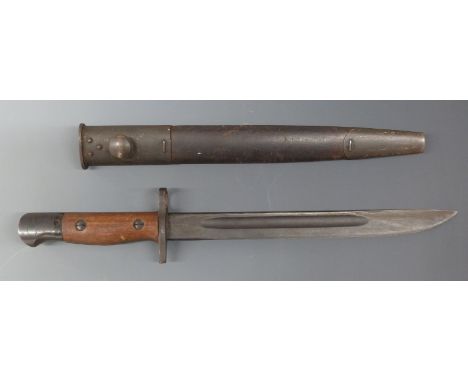 WWII Australian 'Owne' bayonet in scabbard impressed with broad arrow, TP and Mangrovite. Blade length 25cm.&nbsp;