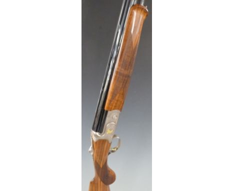 Caesar Guerini Tempio Light 12 bore over and under shotgun with engraved scenes of birds in gilt, all over scrolling decorati