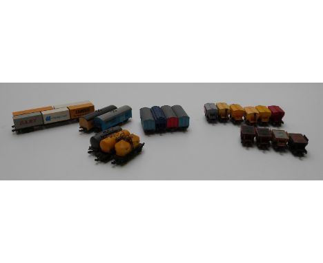 Twenty-one PECO, Lima and Graham Farish N gauge wagons and tankers