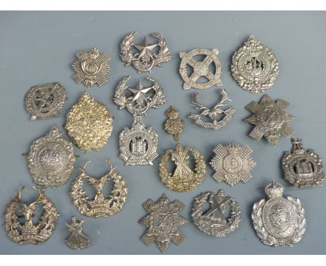 A collection of British Army Scottish cap badges/ Glengarry badges including Gordon Highlanders, London Scottish, Argyll &amp