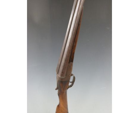 J.Newmark 12 bore side by side shotgun with chequered grip and forend, double trigger and 28 inch barrels, serial number 1782