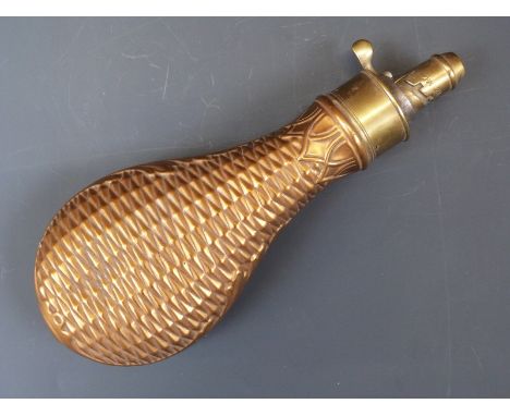 G &amp; J W Hawksley copper and brass powder flask with embossed geometric and acanthus leaf decoration, 21cm long