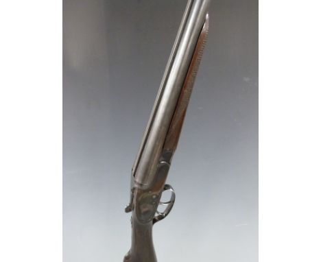 Czechoslovakian 12 bore side by side shotgun with sidelock, chequered grip and forend, double trigger and 28.25 inch barrels,