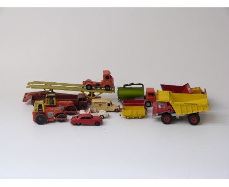 Twelve Dinky Toys and Dinky Supertoys diecast model vehicles including Foden lorry, Hoynor Car Transporter etc