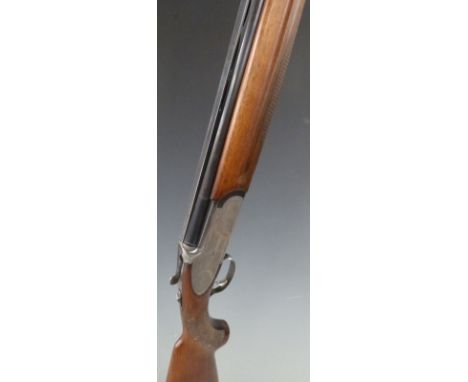 Rizzini 12 bore over and under shotgun with engraved siglocks, underside, trigger guard, top plate and thumb lever, gilt sing