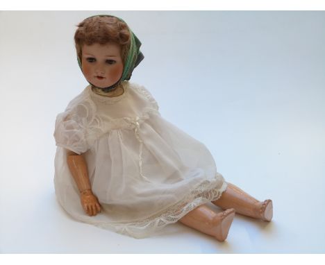 Armand Marseille bisque headed doll with open mouth, weighted brown eyes, brown hair, articulated composite body and white la