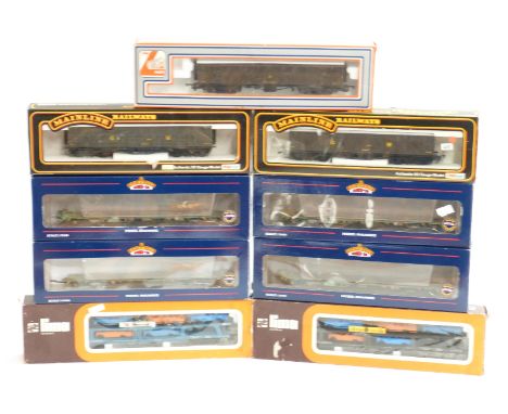 Nine Bachmann, Lima and Mainline 00 gauge wagons including two pairs of weathered Intermodal Flats 37-316, Car Transporters e