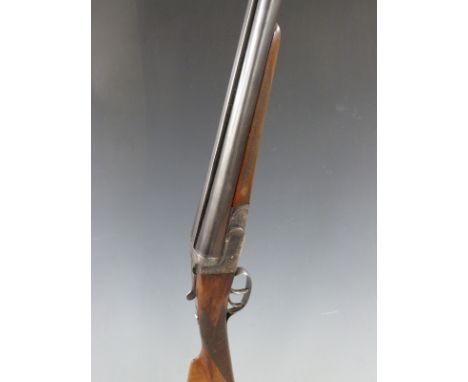 Unnamed 12 bore side by side shotgun with engraved locks, underside, top plate, top lever and trigger guard, chequered grip a