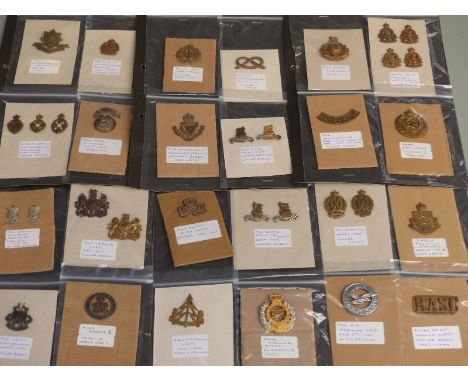 A collection of British Army cap badges / collar badges including the South Irish Horse, The Scottish Horse, the Inns of Cour