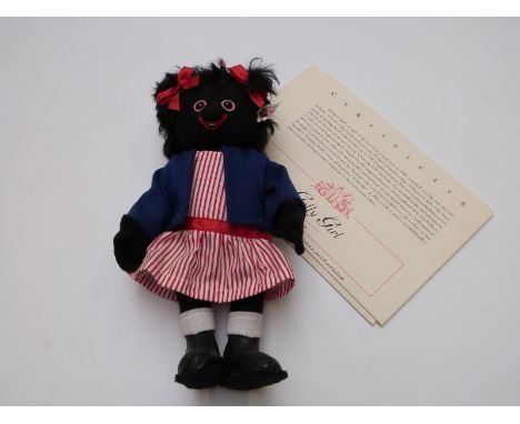 Steiff Teddy bear Golly Girl with black felt body, blue jacket and striped dress, limited UK and Ireland exclusive edition 82