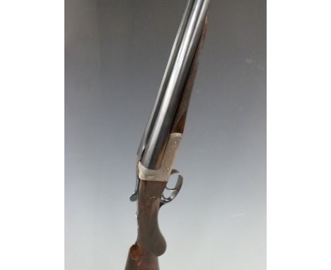 George Bate 12 bore side by side ejector shotgun with gold named lock, all over scrolling engraving, chequered semi-pistol gr