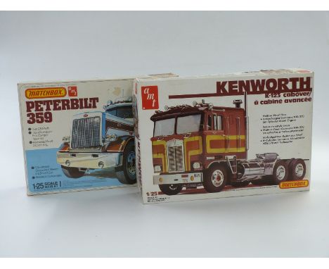 Two Matchbox AMT 1:25 scale model lorry kits Peterbilt 359 PK-6101 and Kenworth K-123 Cabover PK-6106, both in original boxes