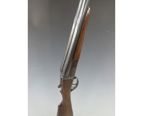 Zabala 12 bore side by side shotgun with named lock, chequered grip and forend and 26 inch barrels, serial number 193404. PLE