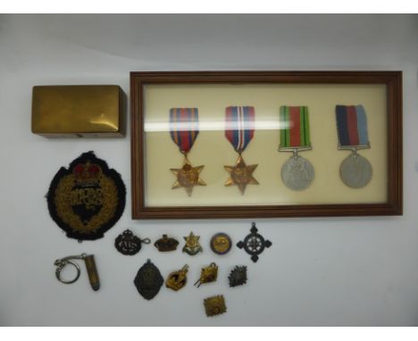 British Army WWII medal group comprising 1939/1945 Star, Burma Star, War Medal and Defence Medal together with some rank insi