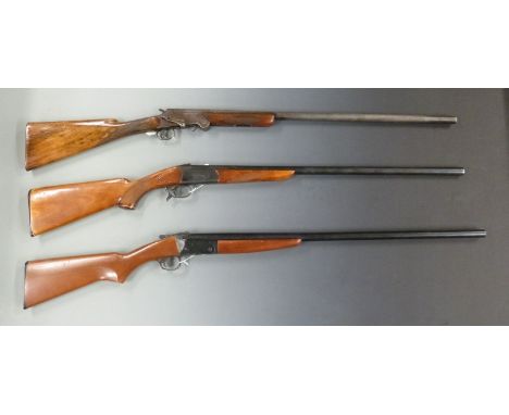 Three single barrelled shotguns&nbsp;Baikal 12 bore with named lock, chequered semi-pistol grip and forend and 28.5 inch barr