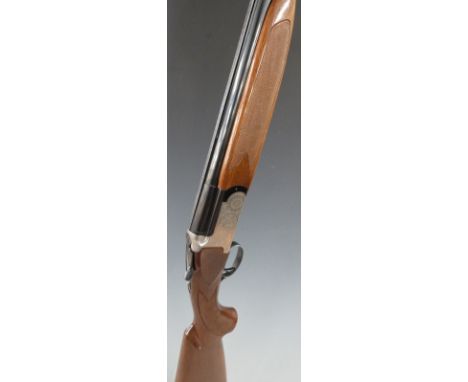 Luigi Franchi 12 bore over and under shotgun with named lock, all over scrolling engraving, chequered semi-pistol grip and fo