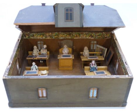 Attributed to Marklin wooden dolls' school room with five tinplate desks, six bisque headed students each approximately 9cm t