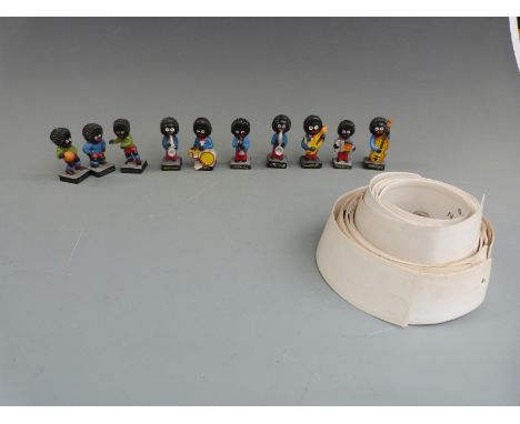 Ten Robertson's golly figures including seven bandsmen and three footballers together with nurse's starched collars and cuffs