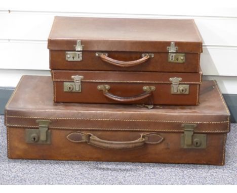 Three vintage leather suitcases, largest W67 x D37 x H17cm&nbsp;