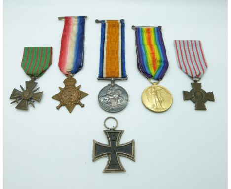 British Army WWI medals comprising 1914 Star, War Medal and Victory Medal named to SE 595 Pte. C.Seares A.V.C, Star named S.S
