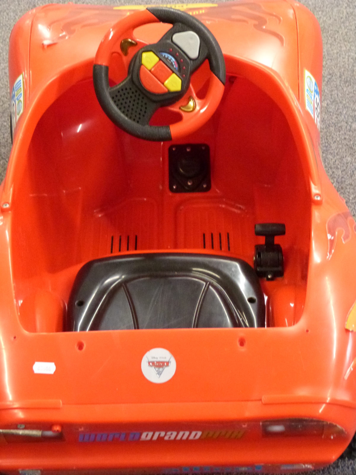 Disney Cars Lightning McQueen electric 'pedal' car, 100x54cm.