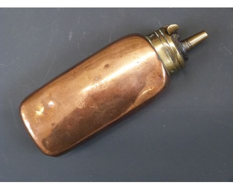 Colt style copper and brass pistol powder flask, 11cm long.&nbsp;