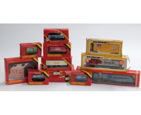 Twelve Hornby and Bachmann 00 gauge locomotives, wagons and accessories including Mallard, Santa Fe etc, all in original boxe