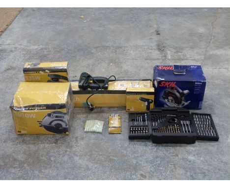 A quantity of tools including folding workbench skill saw, sander, circular saw etc