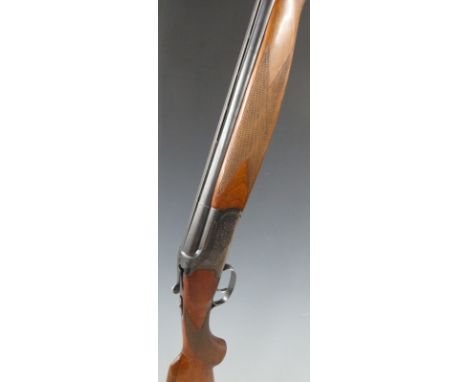 Lanber Amino Express 35 12 bore over and under shotgun with engraved locks, top plate and thumb lever, chequered semi-pistol 