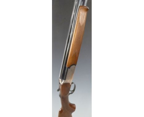 Franco Beretta 12 bore over and under ejector ejector shotgun with all over scrolling engraving, single trigger, chequered se