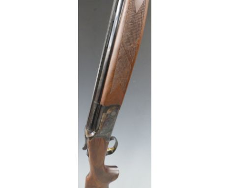 Zabala 20 bore over and under shotgun with gilt single trigger, engraved locks, underside, trigger guard, top plate and thumb