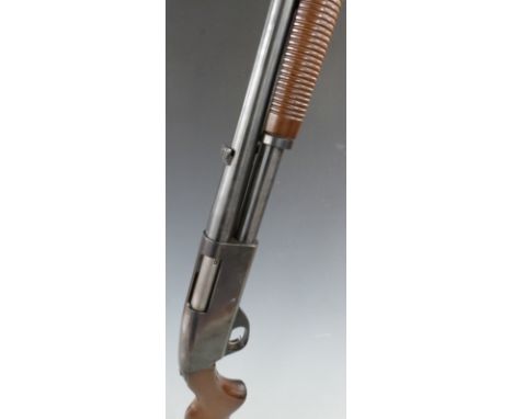 Stevens Model 67 Series E 12 bore five shot pump action shotgun with semi-pistol grip, pop-up sights and named 24 inch barrel