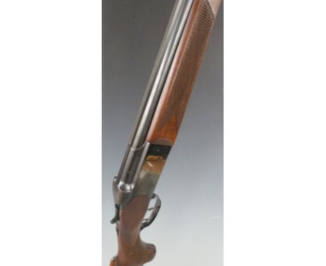 FEG of Hungary 12 bore over and under ejector shotgun with chequered semi-pistol grip and forend, double trigger, sling suspe