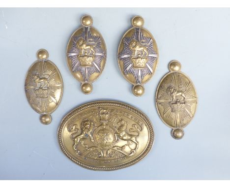 British Army Victorian brass horse furniture, four pieces together with further plaque with coat of arms Waterloo/ peninsula 