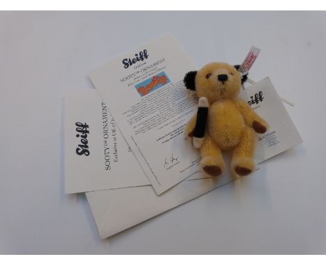 Steiff Teddy bear Sooty with yellow mohair and magic wand, limited edition 292/2000, 11cm tall, in original box with certific