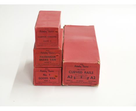 Three Hornby 0 gauge wagons and vans No.1 Goods Van, Hopper Wagon and Passenger Brake Van together with a set of A2 Curved Ra