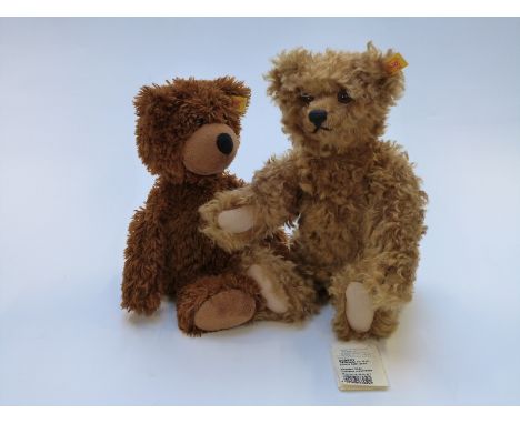 Two Steiff Teddy bears one with brown mohair, jointed limbs and original tags, the other with brown fur and soft body, each 3
