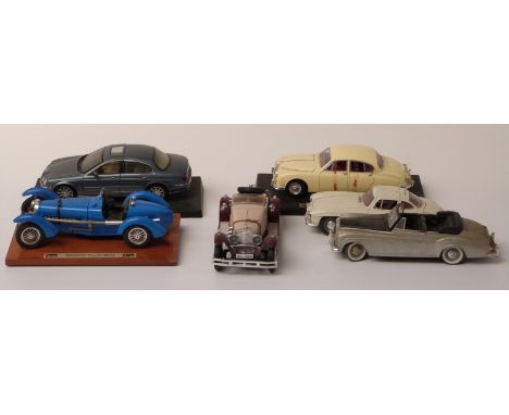 Six Maisto, Burago and Solido large scale diecast model cars including Bugatti, Jaguar, Mercedes etc