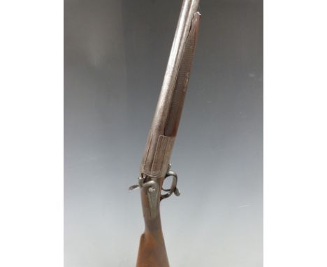 Clough 12 bore single barrel hammer action shotgun with named and engraved lock, fine scrolling engraving to the hammers, top