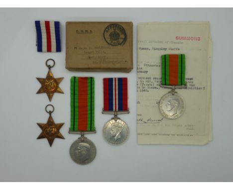 British Army WWII medals comprising 1939/45 Star, France and Germany Star, War Medal and Defence Medal together with a furthe
