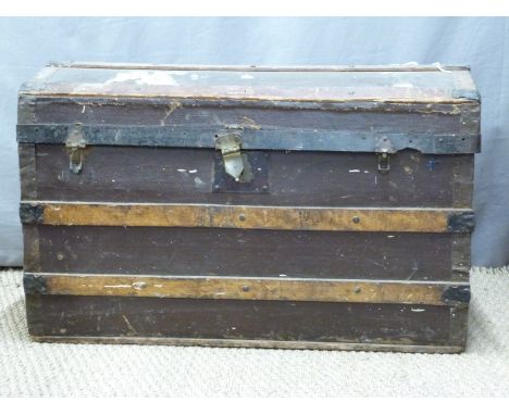 Dome topped wooden bound travelling trunk, length 82cm