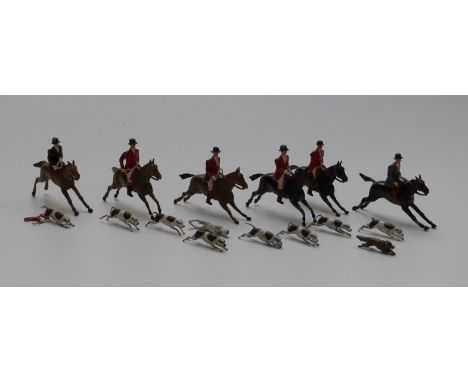 Sixteen Britains cast metal figures and hounds forming a hunting scene
