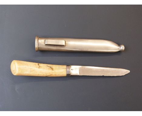 A late 19th/20thC ivory handled hunting or skinning knife in metal scabbard, the blade impressed C or G MOL SV. Blade length 