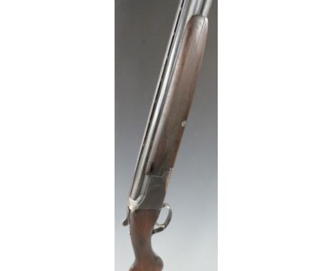 Browning A1 12 bore over and under ejector shotgun with engraved decoration, single trigger, chequered semi-pistol grip and f