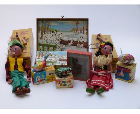 Two Pelham Puppets SS Gypsy and SS Cowboy, three Japanese tinplate Garnier Cubes Disney puzzle blocks and R Journet The Radio