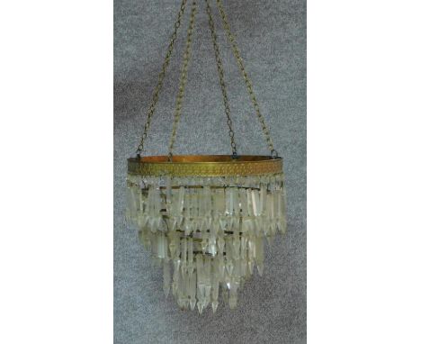 A gilt metal framed hanging basket chandelier with crystal drops. H.32 D.36cm 