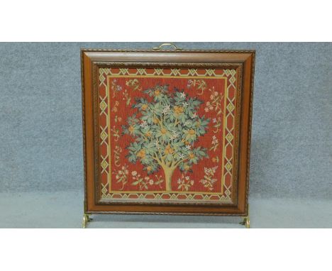 A wooden framed tapestry fire screen. H.66 W.60cm 